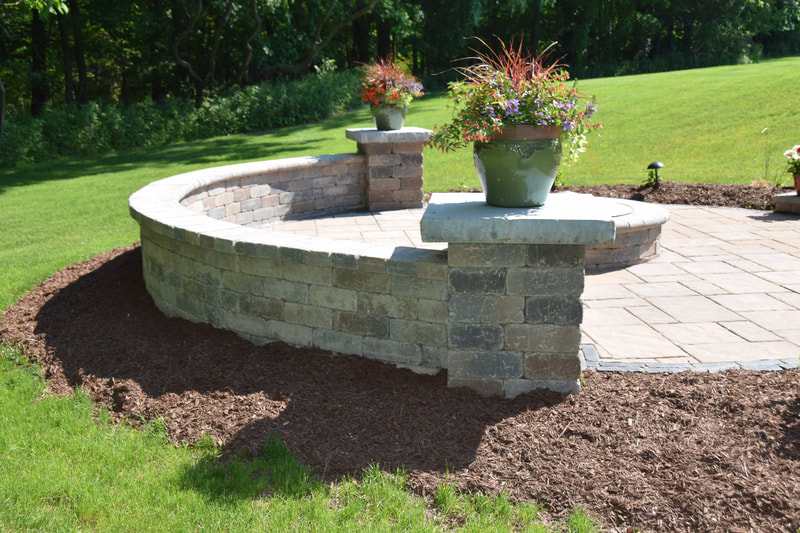 Paver patio with wall